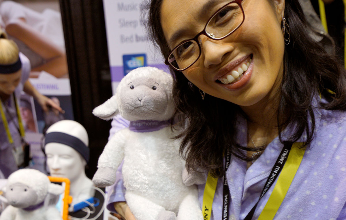 Wei-Shin Lai, inventor and CEO of Acoustic Sheep LLC shows off her invention, the Dozer music player and sleep tracker for children at CES in Las Vegas