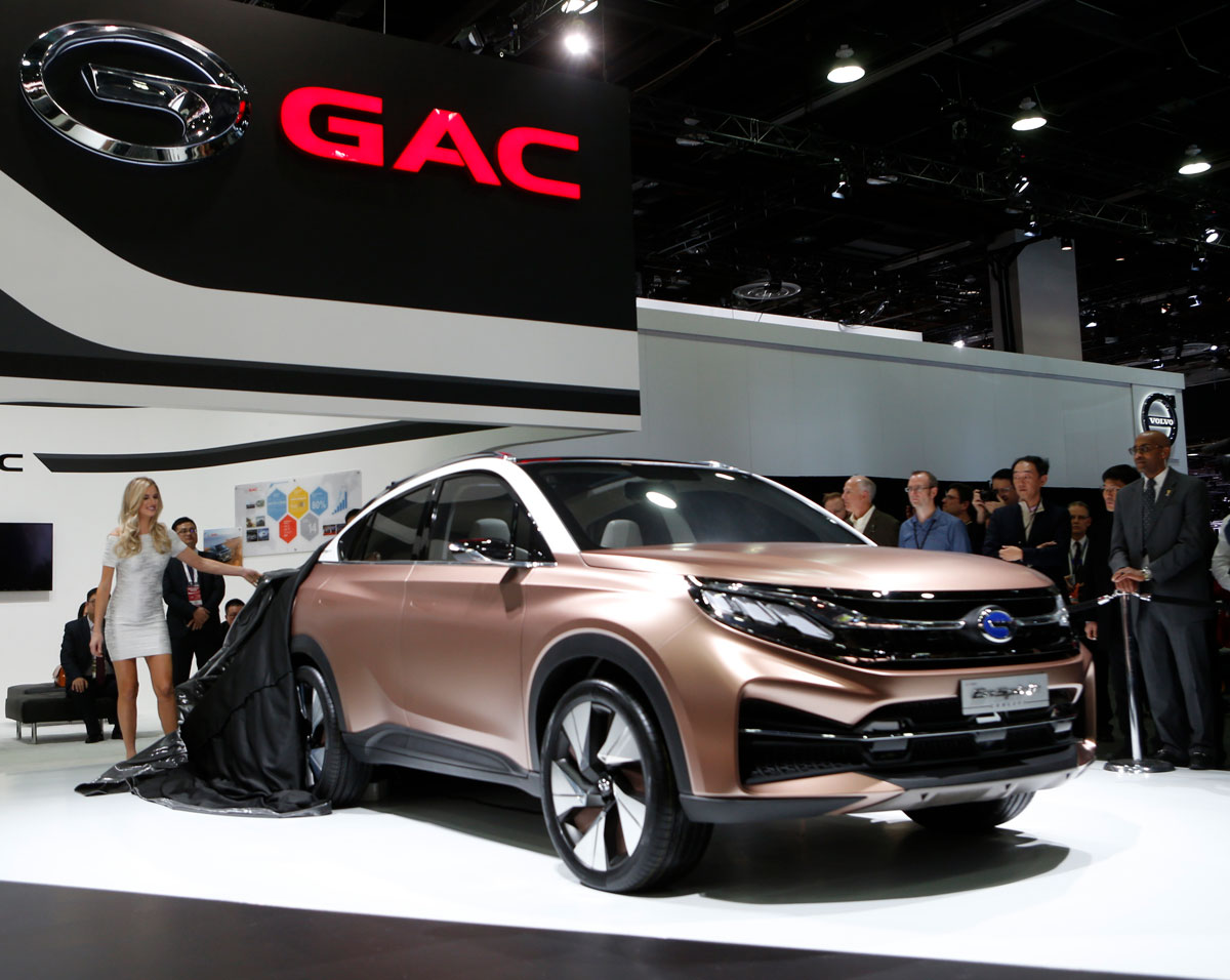 Models unveil the GAC Enspirit hybrid concept car during the North American International Auto Show in Detroit