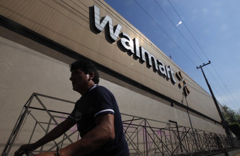 A person walks outside a Wal-Mart store in Mexico City January 11, 2013. REUTERS/Edgard Garrido