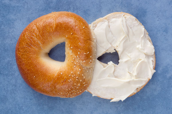 		<p>New York applies an 8 cent charge on bagels, but only if they’re sliced or schmeered (NYC slang for a cream cheese spread). Uncut bagels are tax-exempt because they’re considered a grocery item, while sliced bagels are considered “prepared” food.</p>