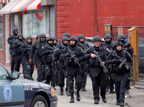 		&lt;p&gt;SWAT teams enter a suburban neighborhood to search an apartment for the remaining suspect in the Boston Marathon bombings in Watertown, Massachusetts April 19, 2013. Police killed one suspect in the Boston Marathon bombing during a shootout and were 