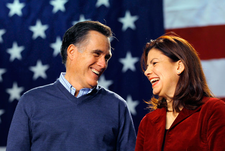 Republican presidential candidate and former Massachusetts Governor Mitt Romney (L) shares a laugh with U.S. Senator Kelly Ayotte (R-NH) during a campaign stop at Pinkerton Academy in Derry, New Hampshire January 7, 2012.  