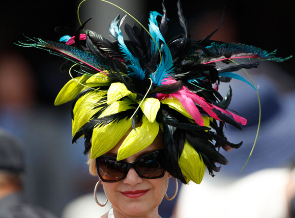 		<p>A woman wears a fancy hat before the Kentucky Derby at Churchill Downs in Louisville, Kentucky, May 5, 2012.  </p>