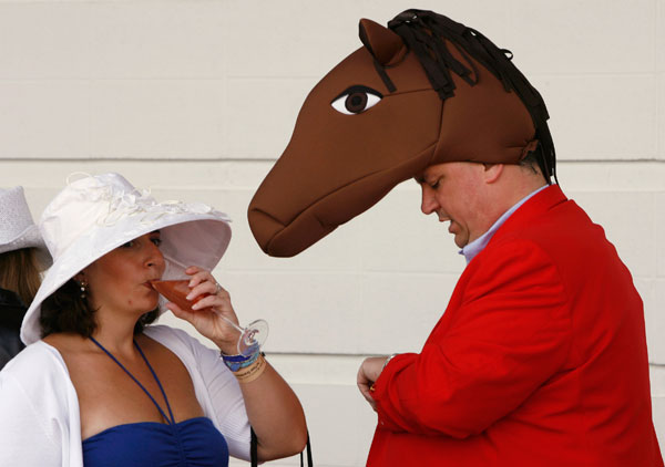 		<p>Race fans stand in the paddock area ahead of the 135th running of the Kentucky Derby at Churchill Downs in Louisville, Kentucky May 2, 2009 </p>