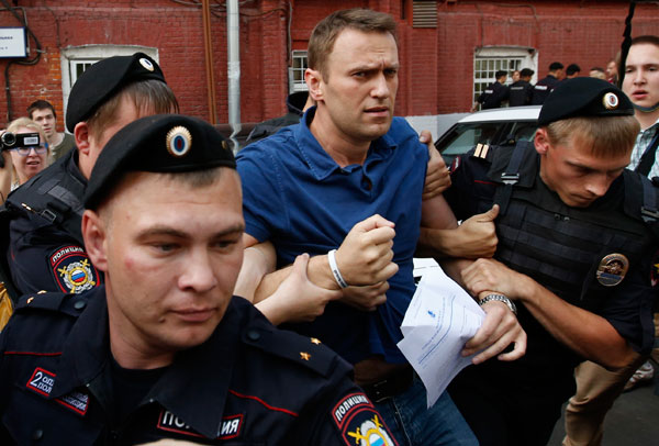 Alexei Navalny, the Russian protest leader, was sentenced to five years in prison on Thursday, July 18, for embezzling nearly half a million dollars from a timber firm. Navalny says the charges were politically motivated and was a leading campaigner again