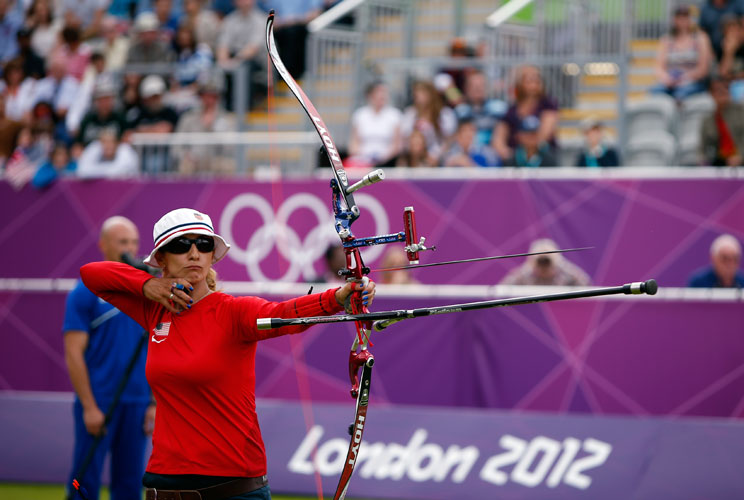 How much can a bow and arrow cost? After all, it was the choice weapon of Robin Hood, guardian of the poor. But today, archery can set competitors back $2,000 in equipment costs. An Olympian archer typically trains by shooting 250 shots a day, six days a 