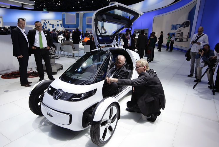 Made entirely of aluminum, with wing doors, this zero-emitting car seats only one. VW is viewing this as its minimalist commuter vehicle. The electric vehicle has a range of 40 miles and weighs only 1,015 pounds.