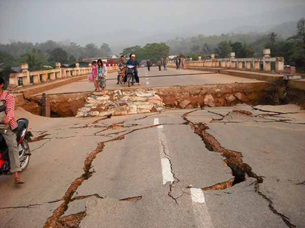 		<p>An earthquake damaged road and bridge are seen in Tarlay March 25, 2011. At least 74 people were killed in a strong earthquake that struck Myanmar, state media said on Friday, while a series of aftershocks have caused panic but only limited damage in