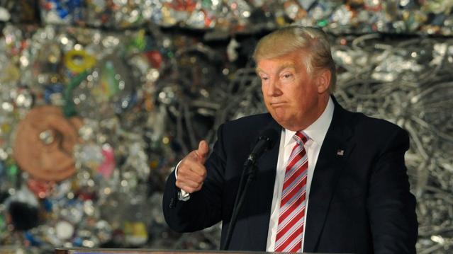 Republican U.S. presidential candidate Trump gestures while delivering speech in Monessen, Pennsylvania