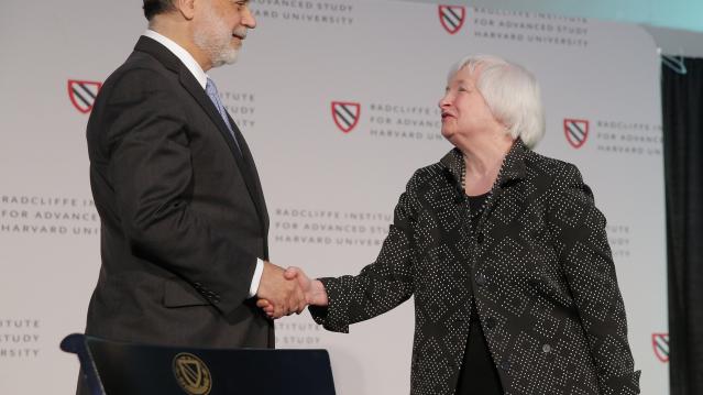 Federal Reserve Chair Janet Yellen is welcomed by former Federal Reserve Chairman Ben Bernanke at Harvard University in Cambridge, Massachusetts