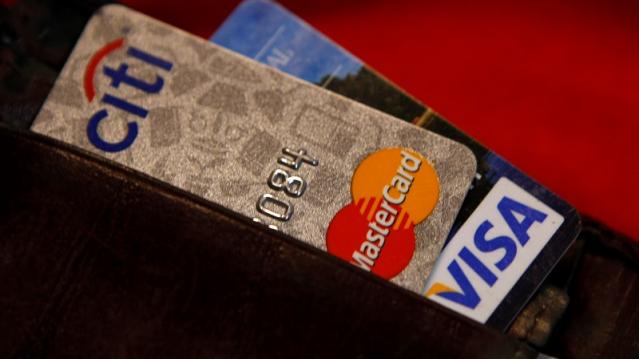 Credit cards are pictured in a wallet in Washington, February 21, 2010. REUTERS/Stelios Varias 