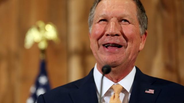 File photo: Ohio Governor John Kasich laughs as he speaks to withdraw as a U.S. Republican presidential candidate in Columbus, Ohio, U.S., May 4, 2016. REUTERS/Aaron Josefczyk 