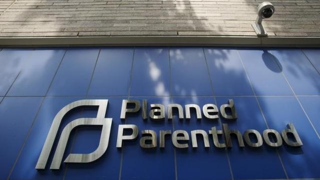 A sign is pictured at the entrance to a Planned Parenthood building in New York August 31, 2015. Picture taken August 31, 2015. REUTERS/Lucas Jackson