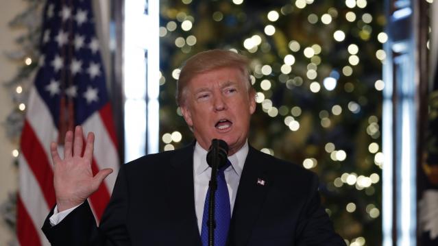 FILE PHOTO: U.S. President Donald Trump delivers a speech on tax reform legislation at the White House in Washington, U.S., December 13, 2017. REUTERS/Carlos Barria
