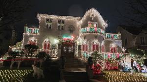 A house in the Dyker Heights neighborhood of Brooklyn is seen lit up with Christmas decorations in New York