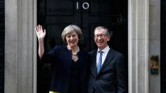 Britain's Prime Minister, Theresa May, and husband Philip pose for the media outside number 10 Downing Street, in central London
