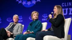 Bill Clinton and Hillary Clinton watch their daughter discuss how she was raised in Temp
