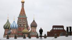 A man walks along Red Square in Moscow