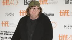 Filmmaker Moore arrives for the premiere of "Where To Invade Next" at the Toronto International Film Festival (TIFF) in Toronto