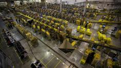 Products are moved on conveyer belts inside Amazon's main fulfillment center  in San Fernando de Henares