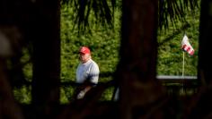 President Donald Trump plays golf at his Trump International Golf Club in West Palm Beach, Florida on December 28, 2020.WPB
