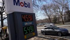 Gasoline prices are displayed at a gas station following Russia's invasion of Ukraine in Washington