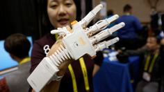 Anna Choi of Neofect demonstrates the Rapael Smart Glove therapy device for stroke victims at CES in Las Vegas