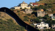 The Wider Image: Along the U.S. - Mexico border fence 