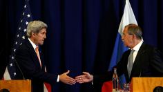 John Kerry and Russian Foreign Minister Sergei Lavrov hold a news conference in Geneva