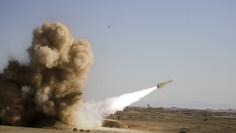 An anti aircraft missile is fired during a war game near the city of Semnan