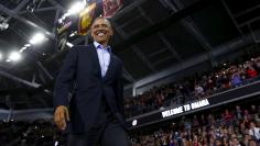 U.S. President Obama arrives to deliver remarks at the University of Nebraska Omaha arena in Omaha