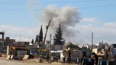 Smoke rises in a site hit by what activists said were airstrikes carried out by the Russian air force in the town of Saraqib, in Idlib province, Syria