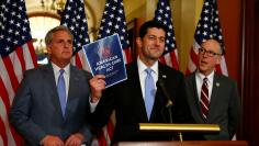U.S. House Majority Leader Kevin McCarthy, U.S. House Speaker Paul Ryan, and  U.S. Representative Greg Walden hold a news conference on Capitol Hill in Washington