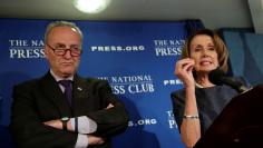 Senate Minority Leader Chuck Schumer and House Minority Leader Nancy Pelosi speak at the National Press Club in Washington