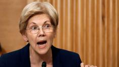 Senator Warren questions Wells Fargo CEO Stumpf at Senate Banking Committee hearing on firm's sales practices on Capitol Hill in Washington