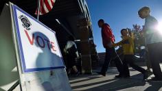 People enter a polling staton to cast their ballot during the 2016 presidential election in Las Vegas, Nevada