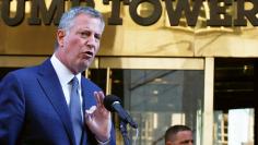 New York City Mayor Bill de Blasio speaks with the media after meeting with U.S. President-elect Donald Trump at Trump Tower in New York 