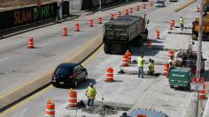 Road work and construction is done on the streets of Peoria, Illinois