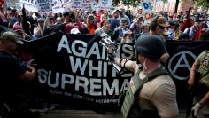 Members of white nationalists are met by a group of counter-protesters in Charlottesville Virginia