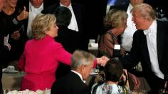 Clinton and Trump shake hands after their remarks at the Alfred E. Smith Memorial Foundation dinner in New York