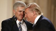 U.S. President Donald Trump and Neil Gorsuch smile as Trump nominated Gorsuch to be an associate justice of the U.S. Supreme Court at the White House in Washington