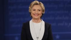 Clinton smiles during the presidential town hall debate with Trump at Washington University in St. Louis