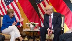 German Chancellor Angela Merkel and U.S. President Donald Trump before talks at the G7 summit in Taormina