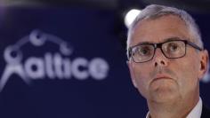 FILE PHOTO: Michel Combes, Chief Executive Officer of Altice Group, attends a news conference in Paris, France, March 21, 2017. REUTERS/Philippe Wojazer 