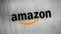 FILE PHOTO: Amazon.com's logo is seen at Amazon Japan's office building in Tokyo, Japan, August 8, 2016. REUTERS/Kim Kyung-Hoon/File Photo