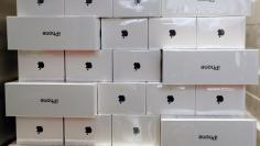FILE PHOTO: Boxes of iPhone X are pictured during its launch at the Apple store in Singapore, November 3, 2017. REUTERS/Edgar Su/File Photo