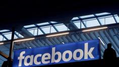 FILE PHOTO: Facebook logo is seen  at a start-up companies gathering at Paris' Station F in Paris, France on January 17, 2017. REUTERS/Philippe Wojazer/File Photo