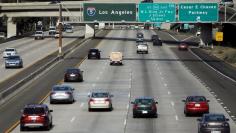 FILE PHOTO: Cars travel north towards Los Angeles on interstate highway 5 in San Diego, California February 10, 2016. REUTERS/Mike Blake