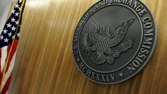 FILE PHOTO: The seal of the U.S. Securities and Exchange Commission hangs on the wall at SEC headquarters in Washington, DC, U.S., June 24, 2011.   REUTERS/Jonathan Ernst/File Photo