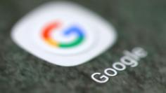The Google app logo is seen on a smartphone in this picture illustration taken September 15, 2017. REUTERS/Dado Ruvic/Illustration